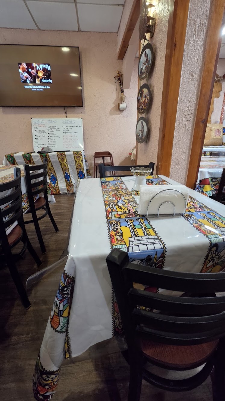 Restaurant tables dressed with traditional Ethiopian tablecloths