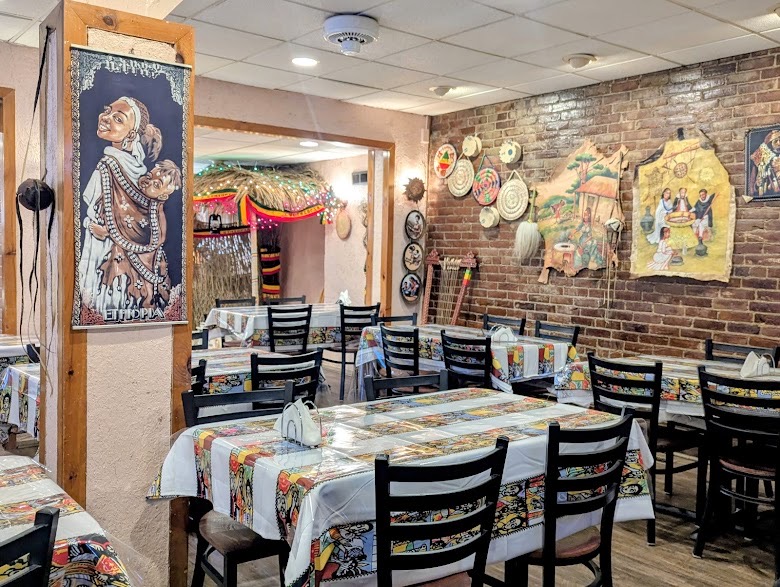 Interior dining room with Ethiopian art and traditional textiles