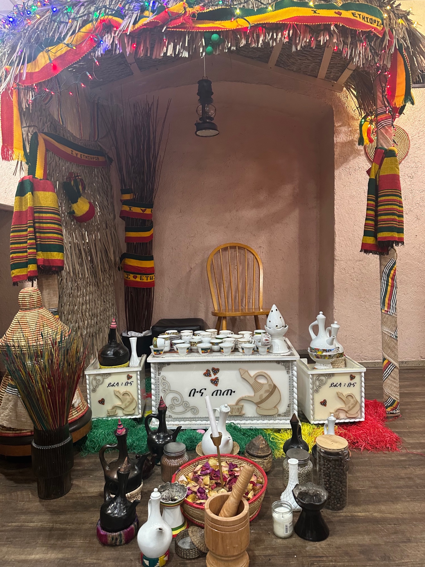 Ethiopian coffee ceremony setup with traditional jebena and cups